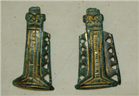 These Anglo Saxon gilded clothing fasteners date from around 550. Rich people wore fasteners like these on their sleeves.